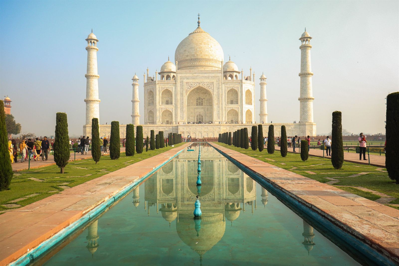 The Taj Mahal reflected in its long garden pool in Agra, a favorite add-on to India river cruise holidays